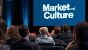conference. people listening to presentation on market fit and culture fit